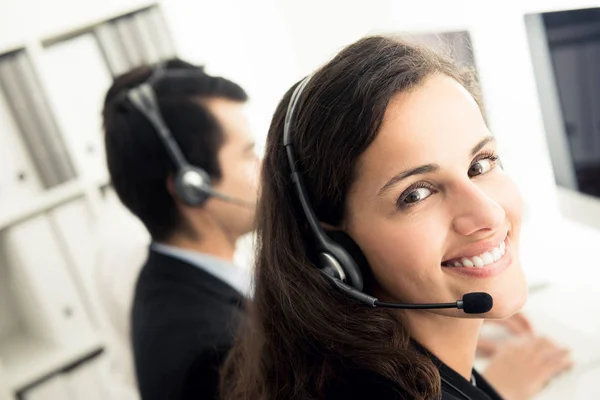 Business woman working in call center — Stock Photo, Image