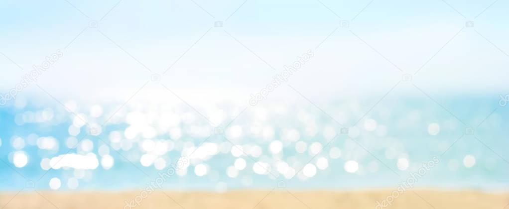 Abstract bokeh background from summer blue sea water at the beac