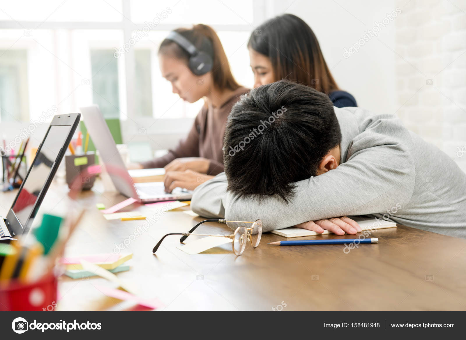Student Sleeping On Desk Stock Photo C Kritchanut 158481948