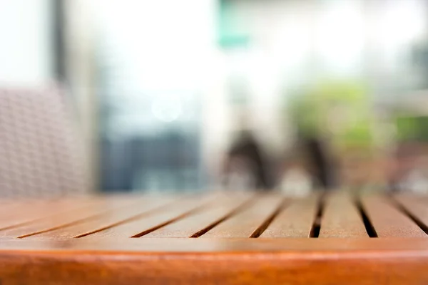 Empty round wood table top in outdoor cafe — Stock Image Empty round wood table top in outdoor cafe Royalty Free Stock Photos