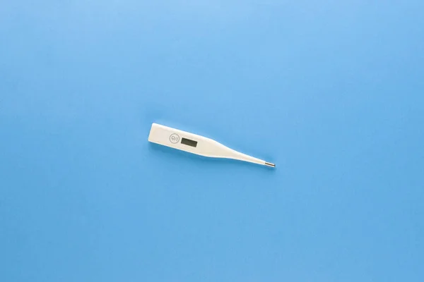 Clinical Digital Thermometer Checking Body Temperature Isolated Light Blue Background — Stock Photo, Image
