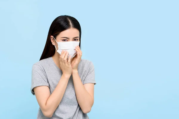 Asian Woman Wearing Medical Face Mask Coughing Isolated Light Blue — Stock Photo, Image