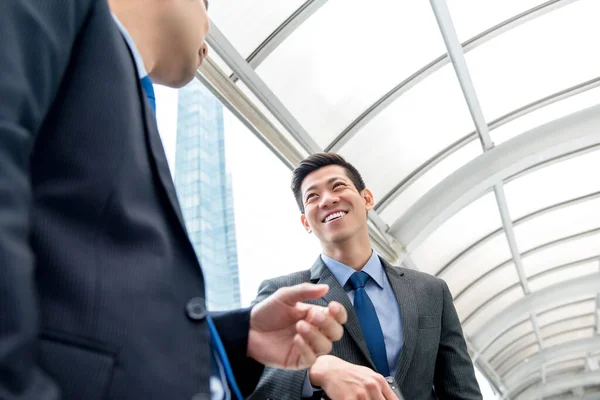 Young Handsome Asian Chinese Businessman Talking Partner Outdoors Covered Walkway — Stock Photo, Image