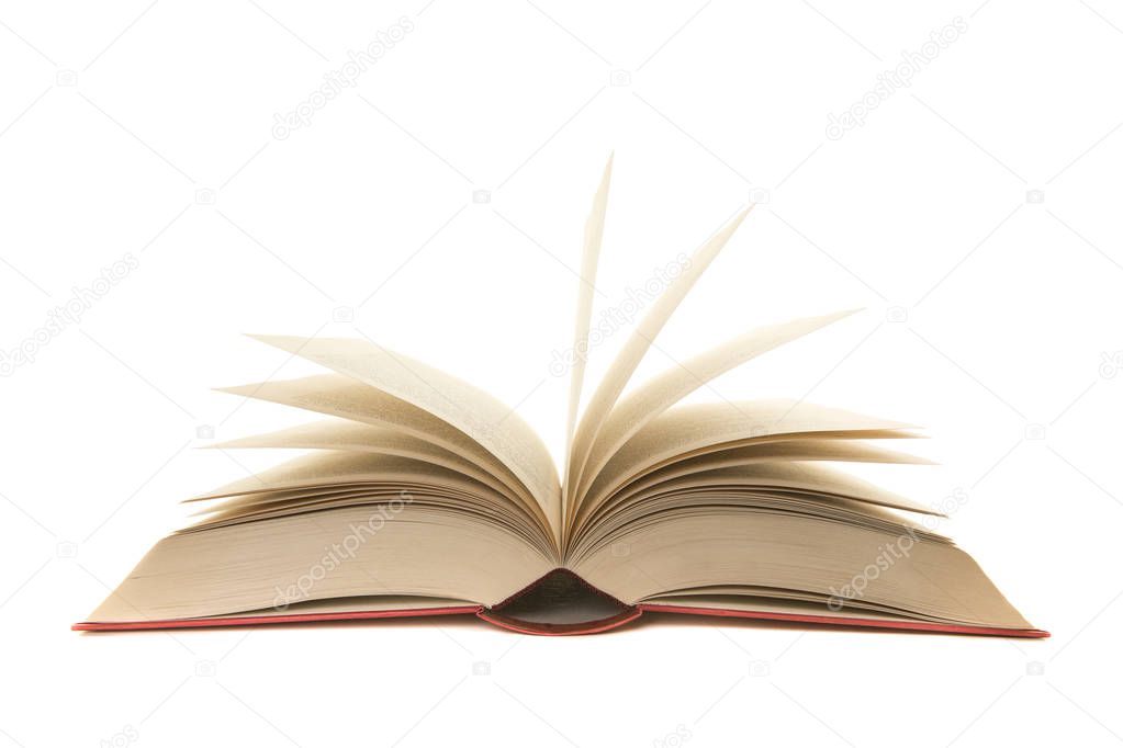 Open old red book with pages standing up isolated on a white background