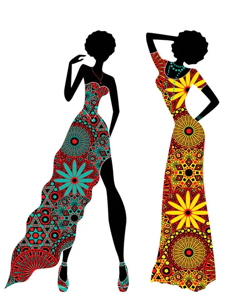 Slender stylish women in ornate ethnic long dresses — Stock Vector