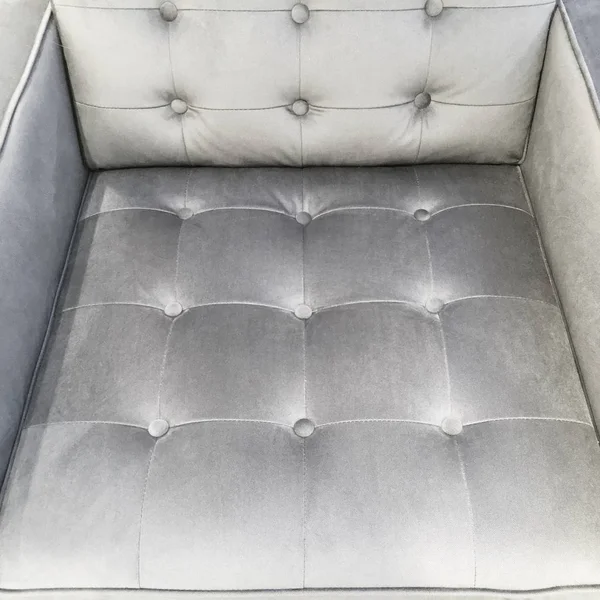 Sillón de moda sedoso con botones decorativos —  Fotos de Stock