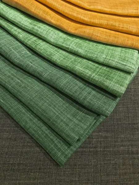 Choice of green and yellow textiles — 스톡 사진