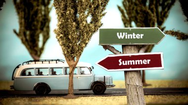 Street Sign to Winter versus Summer clipart