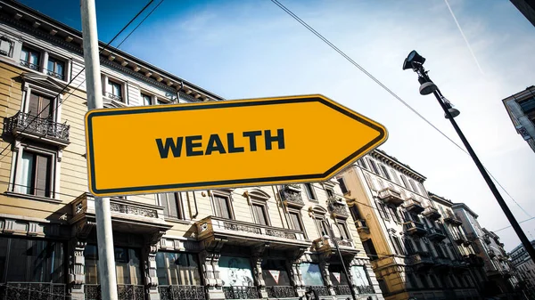 Straatnaambord aan rijkdom — Stockfoto