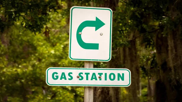 Street Sign to Gas Station — Stock Photo, Image