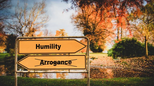 Señal de calle hacia la humildad versus la arrogancia —  Fotos de Stock