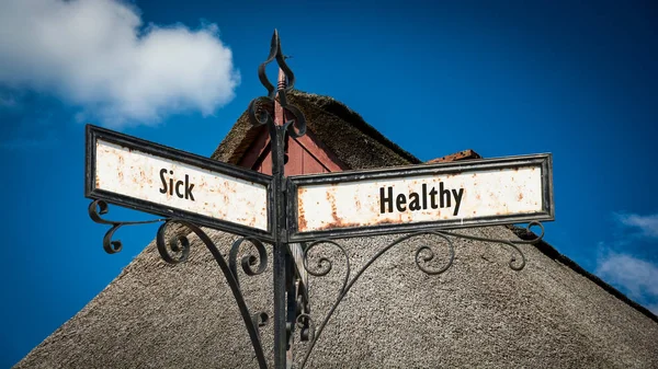 Señal de calle para saludable versus enfermo — Foto de Stock