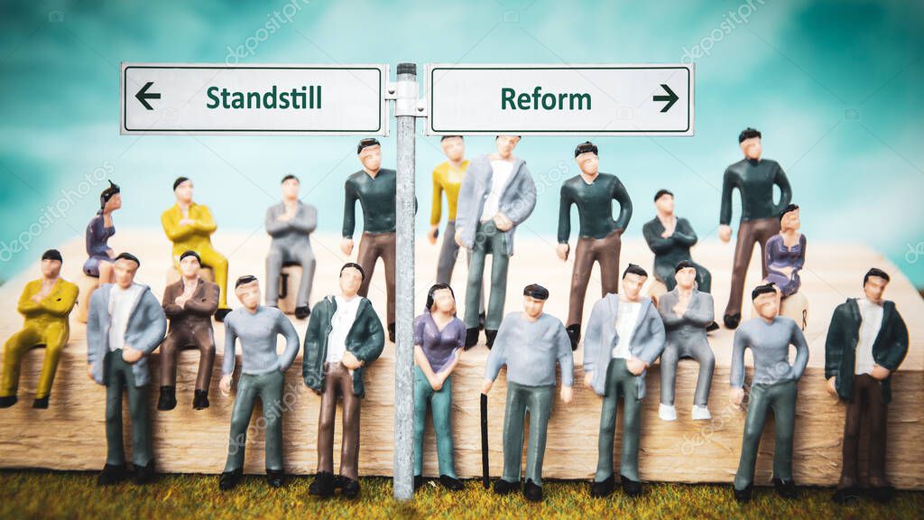 Street Sign the Direction Way to Reform versus Standstill