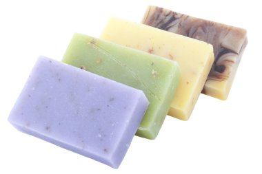 Beyaz arka plan üzerinde izole dört el yapımı Sabun