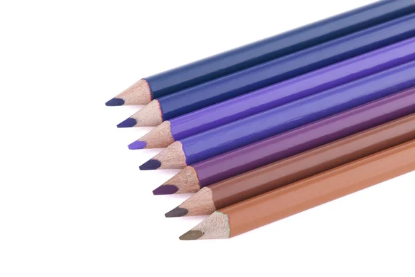 Crayons colorés de spectre bleu-brun isolés sur fond blanc — Photo