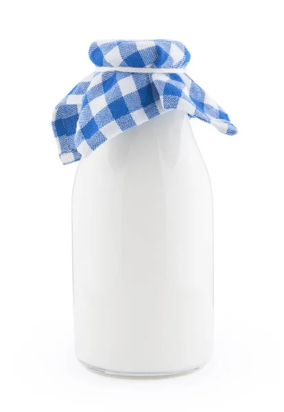 Vieja botella de vidrio de leche aislada sobre fondo blanco Imagen de stock