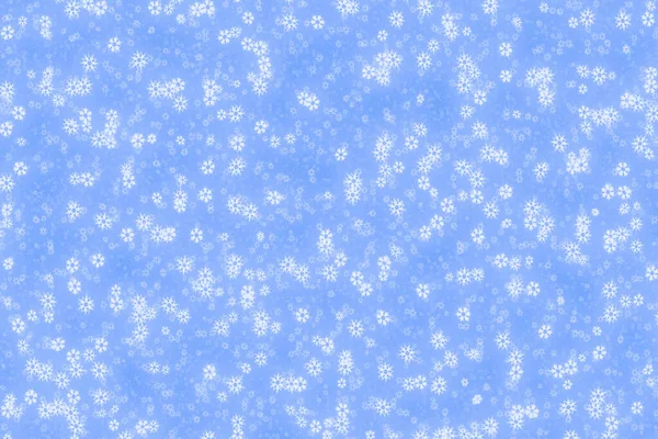 青い背景と雪の結晶 — ストック写真