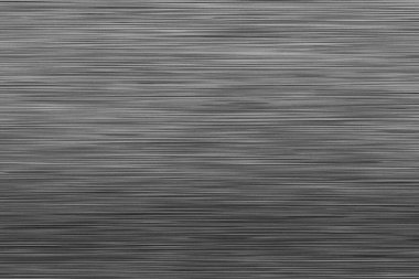 Fırçalanmış koyu metal doku. Hafif yansımalı cilalanmış metal arkaplan.