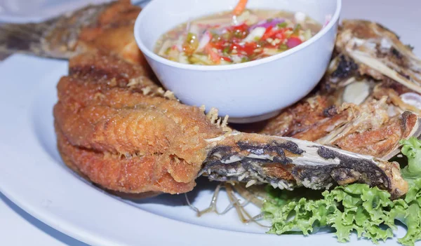 Snapper fried in a restaurant — Stock Photo, Image