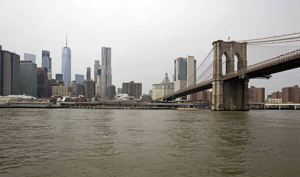 View of Brooklyn bridge an Manhattan taken from Hudson river
