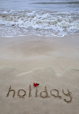 Kum okyanus tarafından yazılmış sözcük tatil