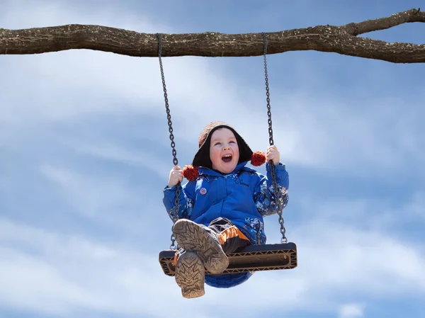 Baby on the swing — Stock Photo, Image