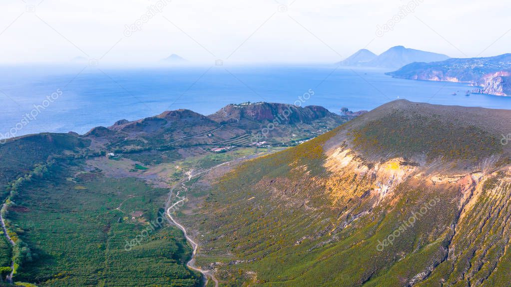 Aerial view photo from flying drone of Amazing grand Vulcano crater with fumaroles on Island of Vulcano, into Lipari ,Eolie Islands. Panoramic View of crater taken Italy, Sicily (series)
