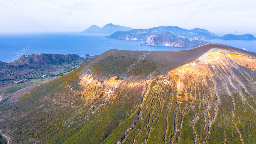 Aerial view photo from flying drone of Amazing grand Vulcano crater with fumaroles on Island of Vulcano, into Lipari ,Eolie Islands. Panoramic View of crater taken Italy, Sicily (series)