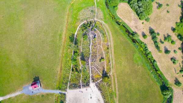 Beautiful Aerial view photo from flying drone panoramic on Hill of Crosses (Kryziu kalnas), a famous site of pilgrimage Siauliai, Lithuania. (series)
