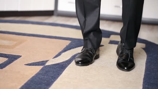 Man flexing new shoes on his feet. close-up — Stock Video