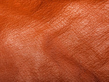 Turuncu deri kıvrım arka planda