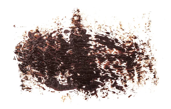 Mancha de tinta marrom óleo no fundo branco — Fotografia de Stock