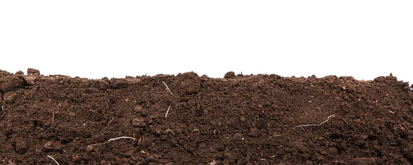 Handful of dark brown soil isolated on white background — Stock Photo, Image