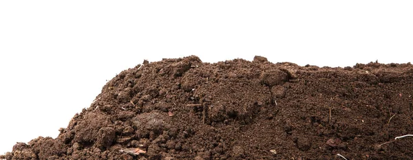 Handful of dark brown soil isolated on white background — Stock Photo, Image