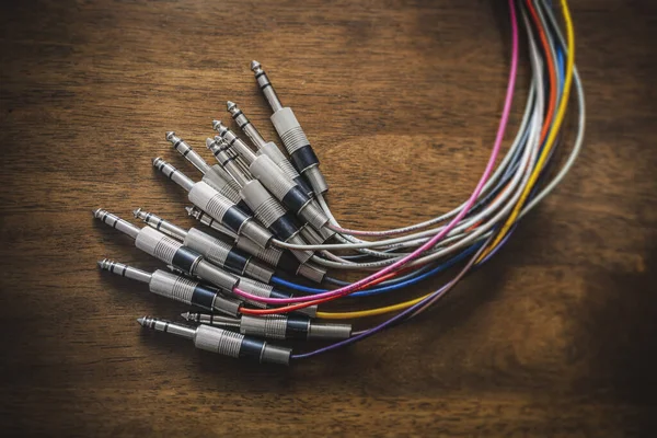 Audio jack plugs with colourful cables — Stock Photo, Image