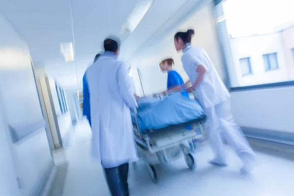Motion Blurred Photograph Patient Stretcher Gurney Being Pushed Speed Hospital — Stock Photo, Image