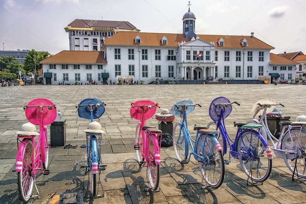 Colorful bicycles in touristic area in Jakarta square
