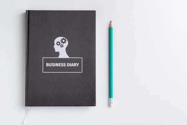 白色背景的商业日志和铅笔孤立 — 图库照片