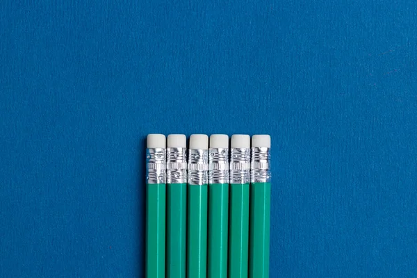 Lápices Aislados Con Borrador Sobre Fondo Azul —  Fotos de Stock