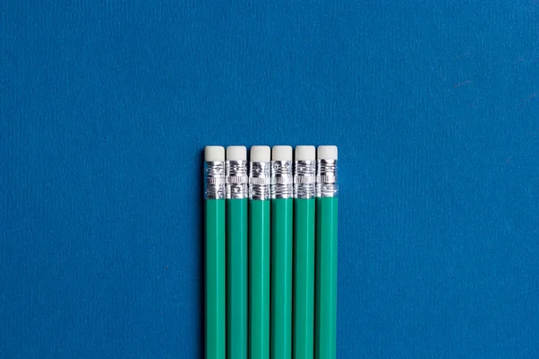 Lápices Aislados Con Borrador Sobre Fondo Azul —  Fotos de Stock