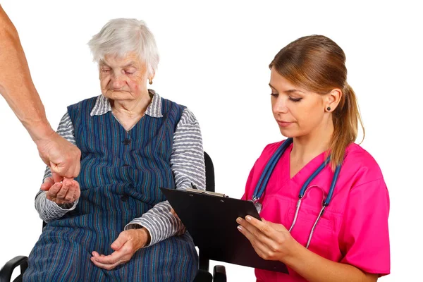 Senior man at the doctor — Stock Photo, Image