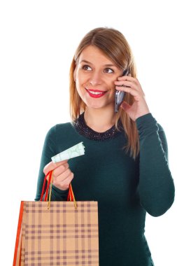 Noel alışveriş yaparken telefondaki kadın