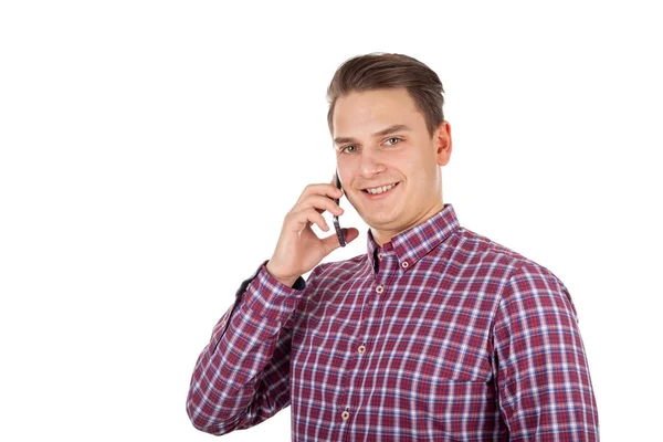 Knappe jonge man op de telefoon — Stockfoto