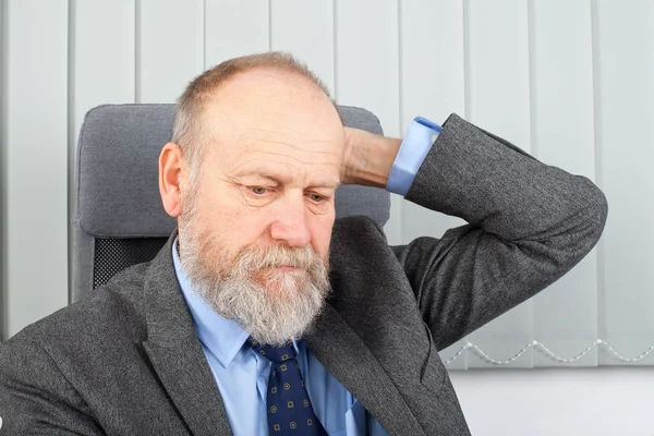 Stressed businessman at the office — Stock Photo, Image