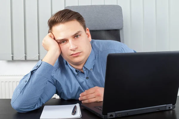 Exhausted businessman at the office — Stock Photo, Image