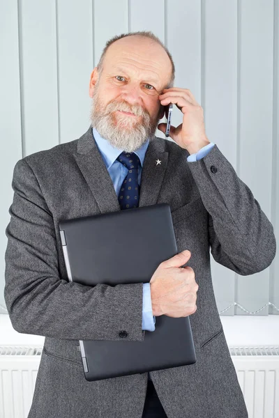 Affärsman i telefon — Stockfoto