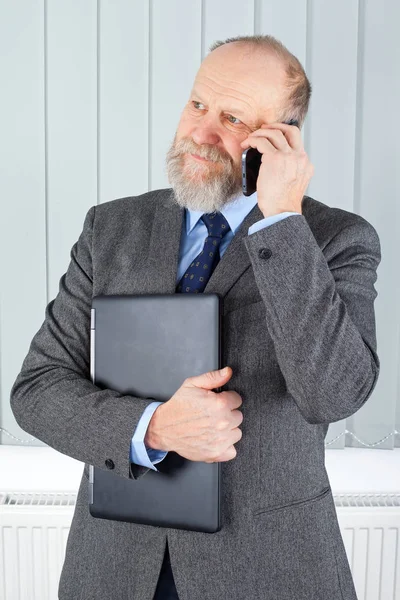 Affärsman i telefon — Stockfoto