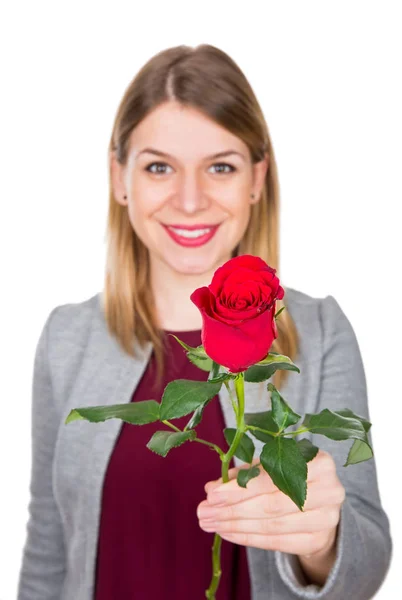Beautiful woman holding a rose — Stock Photo, Image