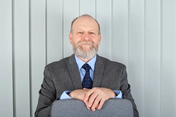 Aged elegant man at the office — Stock Photo, Image