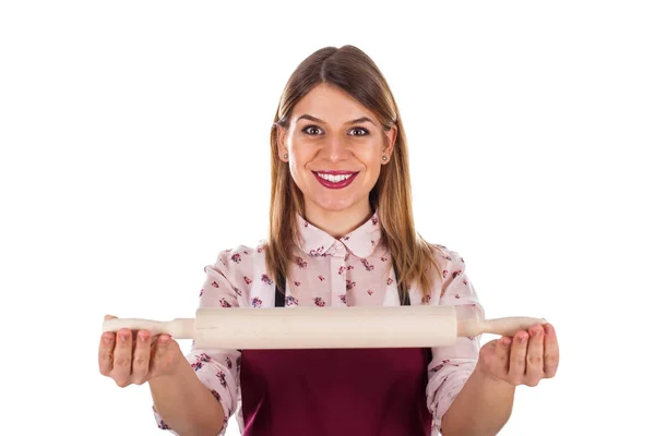 Smiling woman holding a baking rolling pin — Stock Photo, Image